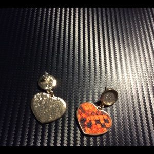 Gold heart faux snakeskin earrings.